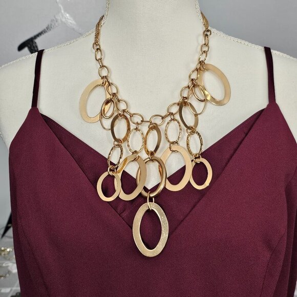🏆Paparazzi A Golden Spell Gold Tone Link Ring Bib Statement Necklace - Picture 1 of 5